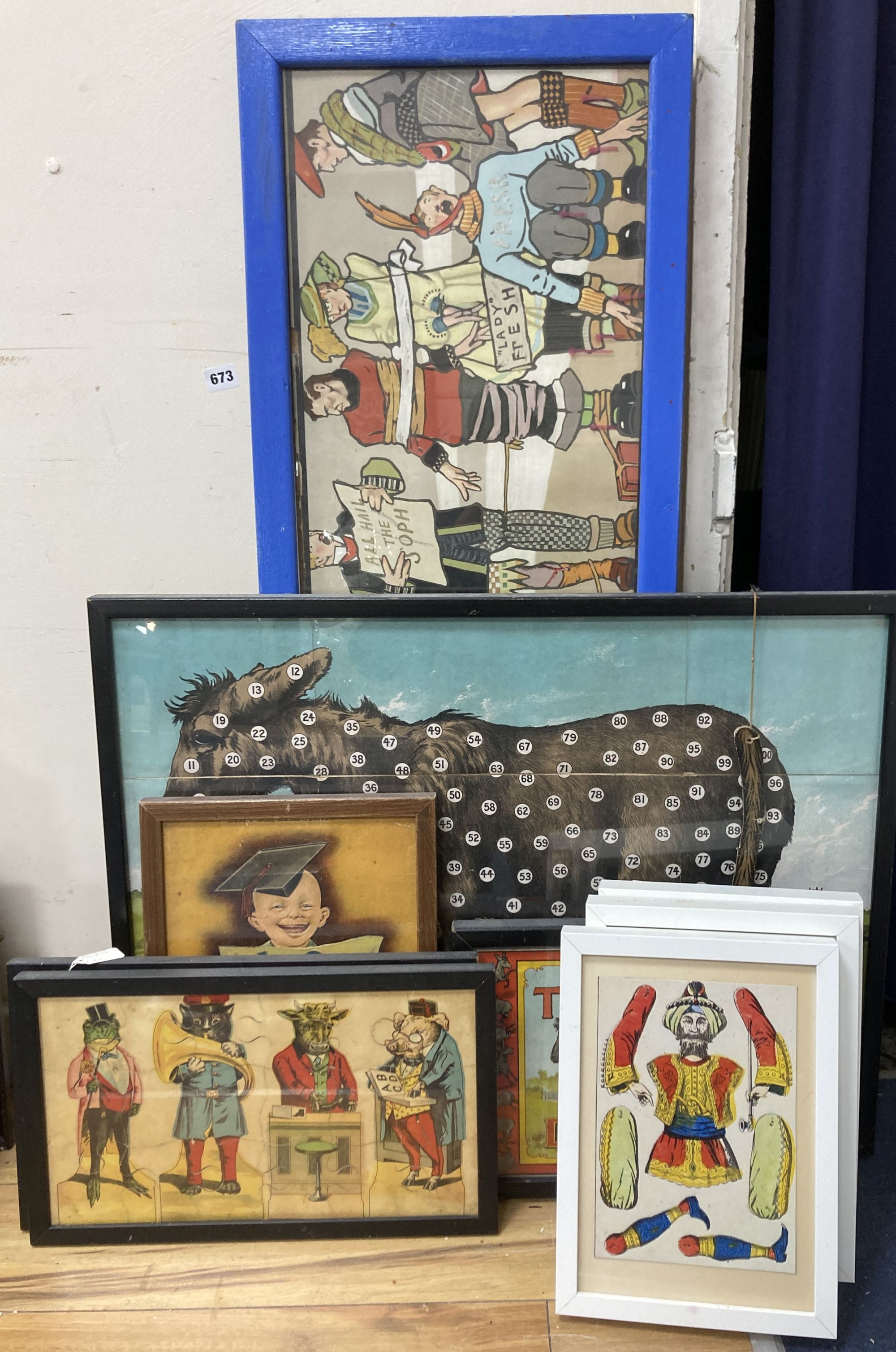 A group of Victorian and later chromolithographs and colour prints, including The tail-less donkey, 54 x 72cm and two jig-saw puzzles